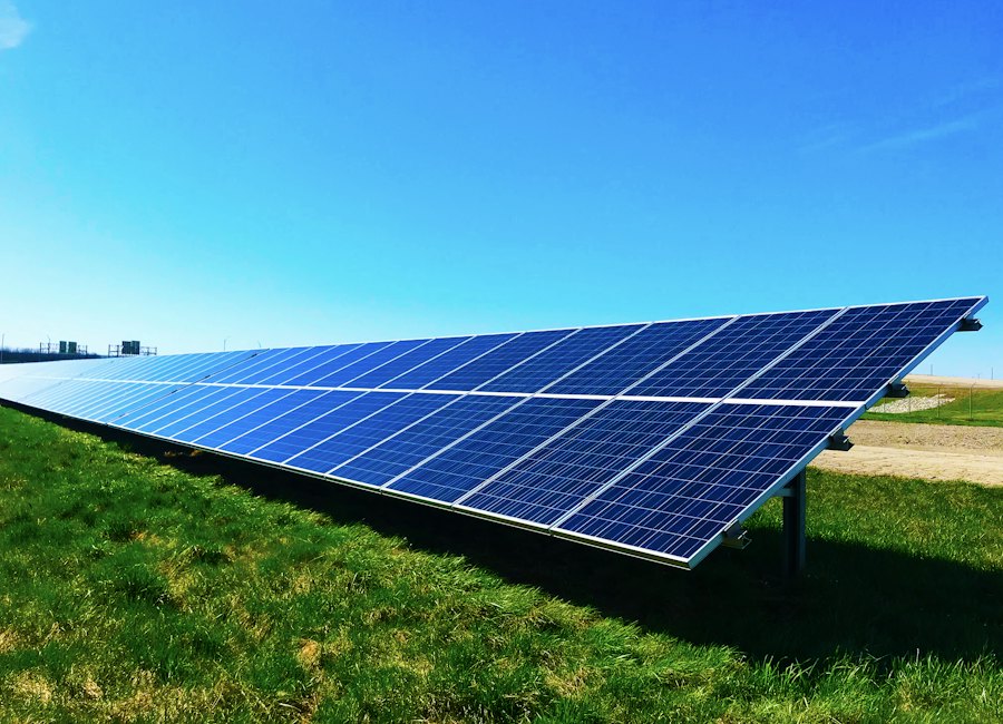 Residential rooftop solar panels under a clear sky
